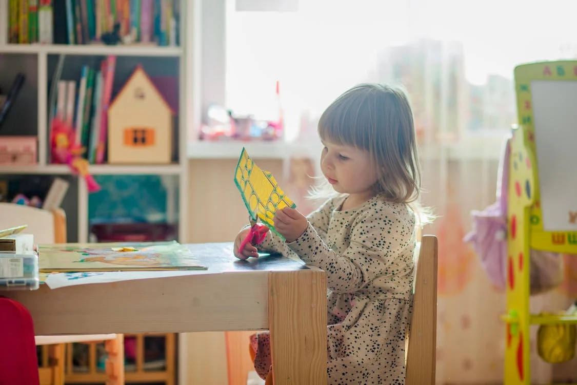 Child-Cutting-a-Paper
